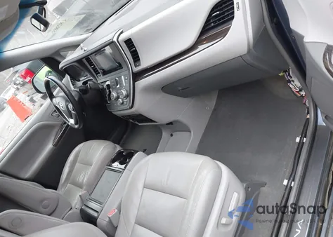 2015 Toyota Sienna Xle Premium 8 Passenger z USA, uszkodzony, nr VIN 5TDYK3DC9FS614764